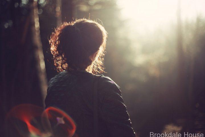 woman staring off in the distance worrying about the future